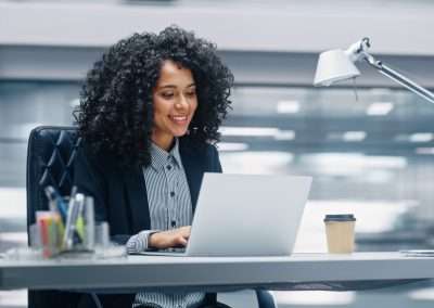 women on computer in office